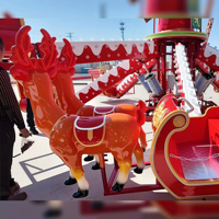 Manège unique sur le thème des luges de Noël, équipé de lumières LED, avec avion autoportant et manège rotatif