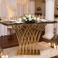 Table de réception de mariage de luxe avec base en acier inoxydable doré et plateau en verre noir