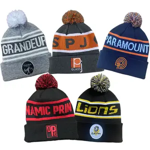 100% Acrylic Custom Logo Football Winter Hats Jacquard Knit Toque puff ball Pom Pom Beanie with custom logo