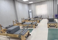 Reformer de Pilates Profesional de Madera de Arce de Alta Calidad para Gimnasios y Clínicas de Fisioterapia