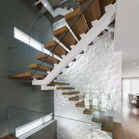 Escalier flottant droit à poutre unique en verre, moderne et de luxe, en métal, pour villa, appartement, hôtel