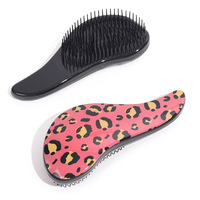 Brosse à cheveux populaire à double face imprimé léopard, peigne coussin d'air à dents denses, brosse démêlante massante pour le cuir chevelu