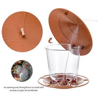 Mangeoire à oiseaux carrée écologique pour petit jardin extérieur, étanche et réglable, à suspendre, en plastique, emballage en boîte de type lapin.