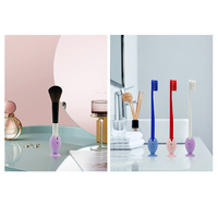 Porte-brosses à dents en forme de poisson avec base à succion Porte-brosses de maquillage en silicone pour évier de salle de bain et comptoir OEM et ODM
