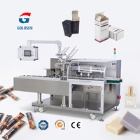 Machine à emballer de boîte à grande vitesse Machine à emballer de cartonnage de dessin animé de savon de petite taille Capsules de café Machine de cartonnage de boîte de parfum