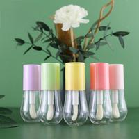 Vente en gros 15ml en forme d'ampoule avec logo personnalisé rose clair jaune mignon brillant à lèvres vide fantaisie tubes avec bouchon à vis de forme ronde