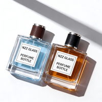 Flacons de parfum de luxe en verre en gros, base épaisse, logo personnalisé, estampage à chaud doré, vaporisateur pompe, tailles 100 ml/50 ml, solutions d'emballage