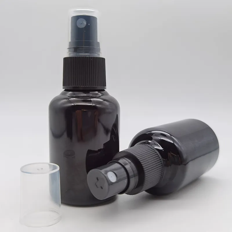 Botol Semprot Plastik Hitam Mengkilat PET Chunky Bahu Bulat Silinder 50Ml dengan Kepala Semprotan Hitam Halus