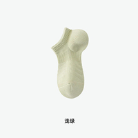 Chaussettes courtes de sport tricotées pour femme, en coton respirant et absorbant la transpiration, avec semelles éponge, coupe invisible et logo sur le bord et le dessous.