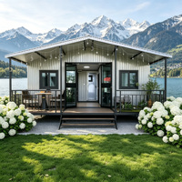 Casa Contenedor Prefabricada Moderna y Expandible con Techo Inclinado, Porche y Varios Materiales de Pared para Jardín, Campamento o Casa de Huéspedes