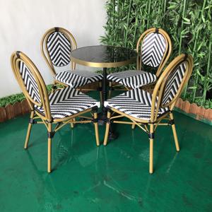 Mesa y sillas de bistro francés moderno para patio exterior, jardín, restaurante, hogar, <span class=keywords><strong>bar</strong></span> o parque, diseño de ratán con material metálico - Product Image 1