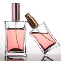 Benutzer definierte leere rechteckige Glas parfüm flaschen 50ml 200ml Kapazität quadratische Form in klarem rosa mattem Bernstein Silber für Frauen Männer