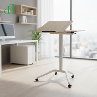 Bureau mobile pneumatique réglable en hauteur pour le télétravail, table pour ordinateur portable assis-debout avec roulettes