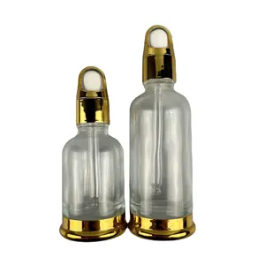 RUIPACK wholesale clear glass essential oil luxury perfume bottles with dropper cap hair oil 30ml for men No reviews yet