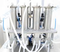 Table de remplissage automatique à quatre têtes pour bouteilles en verre/plastique de 150, 250, 300, 500 ml, pour huiles essentielles, eau et alcool, haute productivité