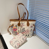 Sac fourre-tout graffiti grande capacité pour femme, sac à main mignon en PU avec fermeture éclair, sac à bandoulière élégant pour l'université, la plage ou le travail