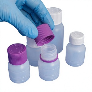 ขวดพลาสติก PET ทรงกลม ฝาเกลียว สำหรับยาและเครื่องสำอาง สีฟ้าตัวขวด สีขาว ฝาสีม่วง ซุปเปอร์อินเตอร์เนชั่นแนล - Product Image 1