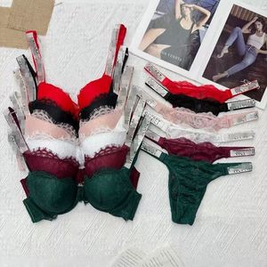 Conjunto de Lencería Sexy de Encaje Tejido Yicheng <span class=keywords><strong>Victoria</strong></span>, Tanga Transpirable, Sujetador con Volantes y Bragas Bordadas con Detalles Secretos - Product Image 1