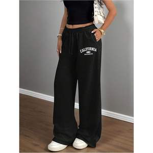Pantalon de survêtement large pour femme, taille élastique, doublure polaire, décontracté, avec poches, motif California - Product Image 1