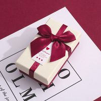 Boîte cadeau exquise en gros pour rouge à lèvres avec nœud papillon et insert en éponge, emballage cosmétique vide