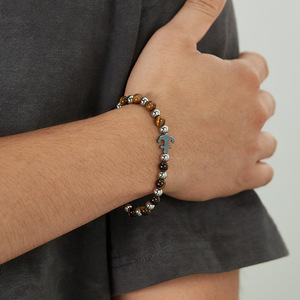 Pulsera de Acero Inoxidable con Cuentas de Piedra Ojo de Tigre y Ancla de Barco, Diseño Moderno en Negro, Joyería para Hombre - Product Image 1
