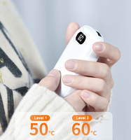 2026 Vente en gros usine Chauffe-mains Power Bank rechargeable USB avec affichage numérique de la température 6000 mAh