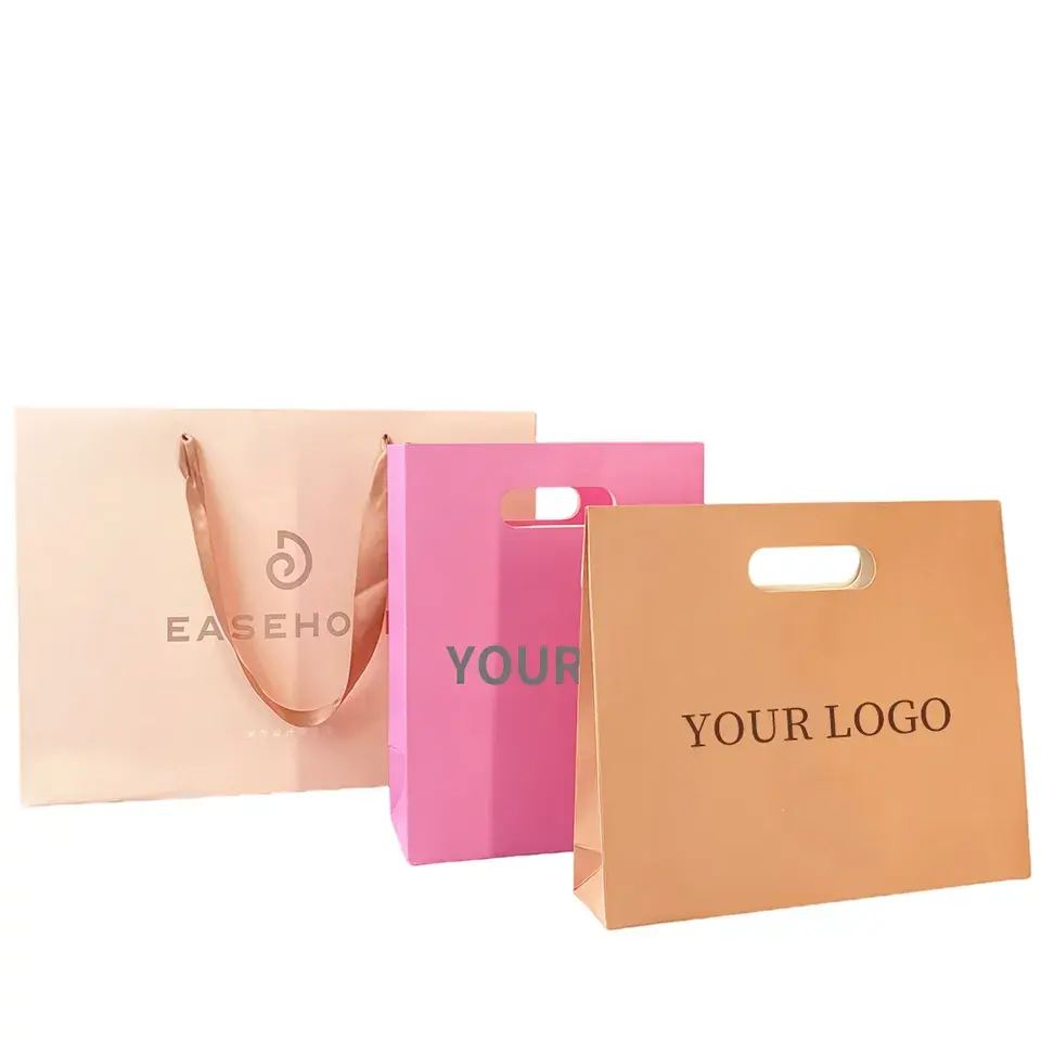 Bolsa de papel de regalo impresa de lujo blanca de fábrica, diseño troquelado personalizado, bolsas de papel para compras al por menor con logotipo personalizado