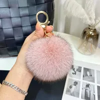 12cm véritable boule de fourrure de renard poms porte-clés pour femmes luxe pompon porte-clés accessoires sac décoration Emo bibelot bijoux cadeaux