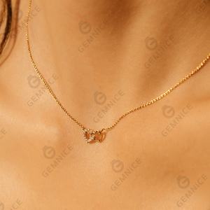 Nuova Collezione Gemnel: Collana con Pendente a Doppio Cuore Intrecciato in Argento 925 Placcato Oro con Diamanti - Product Image 3