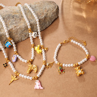 Nuevo conjunto de joyería multielementos, collar y pulsera con cuentas de perlas, joyería apilable a la moda para mujeres.