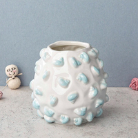 Pot de fleurs de jardin en céramique avec texture en relief marin et design d'escargot terrestre tridimensionnel, couleur personnalisable chromée