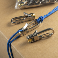 Attache-cordon rétractable multifonctionnel avec boucle de verrouillage, clip de serrage de corde, mousqueton, outil de tension réglable sans nœud pour tente