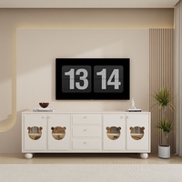 Grand meuble TV minimaliste moderne en style crème Rangement tendance pour petits appartements Table basse sur pied