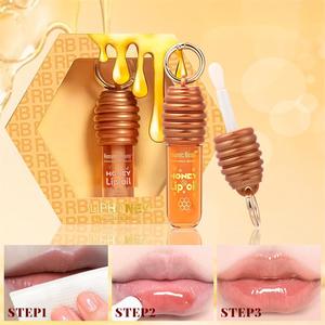 Aceite Labial Suavizante para el Cuidado de Labios con tu Logotipo Francin Gloss, Bálsamo Hidratante con Brillo Marrón Dorado, Textura de Panal, Esencia Herbal Nutritiva - Product Image 1