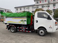 Camion compacteur de déchets électrique pur 4x2 automatique personnalisé pour le transport de déchets de construction et le nettoyage des routes urbaines