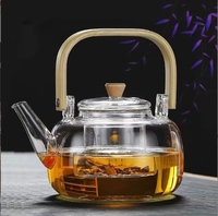 Théière en verre résistant à la chaleur avec poignée en bambou faite à la main en verre à haute teneur en borosilicate avec passoire en verre 900ml