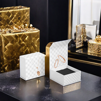 Emballage de luxe fantaisie brillant petite bague boîte cadeau de luxe avec logo personnalisé boîte à bijoux portable en carton papier velours coton insérer