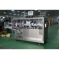 Machine de remplissage et de scellage automatique de liquides pour la fabrication quantitative d'huile, de parfum, de crème, d'ampoules en plastique, de flacons, de crème, de formage automatique