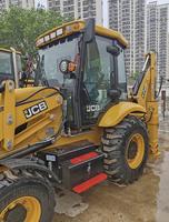 Mini-chargeuse sur pneus JCB 3CX, marque britannique, haute performance, occasion, avec moteur et pompe, 8 tonnes, vente directe