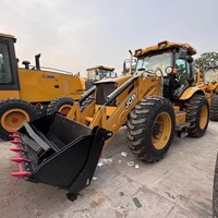 Chargeuse sur pneus rétrocaveuse JCB 3CX 4CX d'occasion, 4x4, état d'origine, mini-tracteur 4CX, roulement avant, moteur