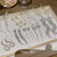 Pendientes de borla de latón con circonitas para mujer, chapados en plata, estilo de lujo ligero, para fiesta, nuevo estilo, atmosféricos, exagerados, Yiwu Bijoux