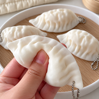 Porte-clés jouet sensoriel anti-stress en TPR blanc, forme dumpling, pour enfants et adolescents de 14 ans et plus, avec chaîne à perles