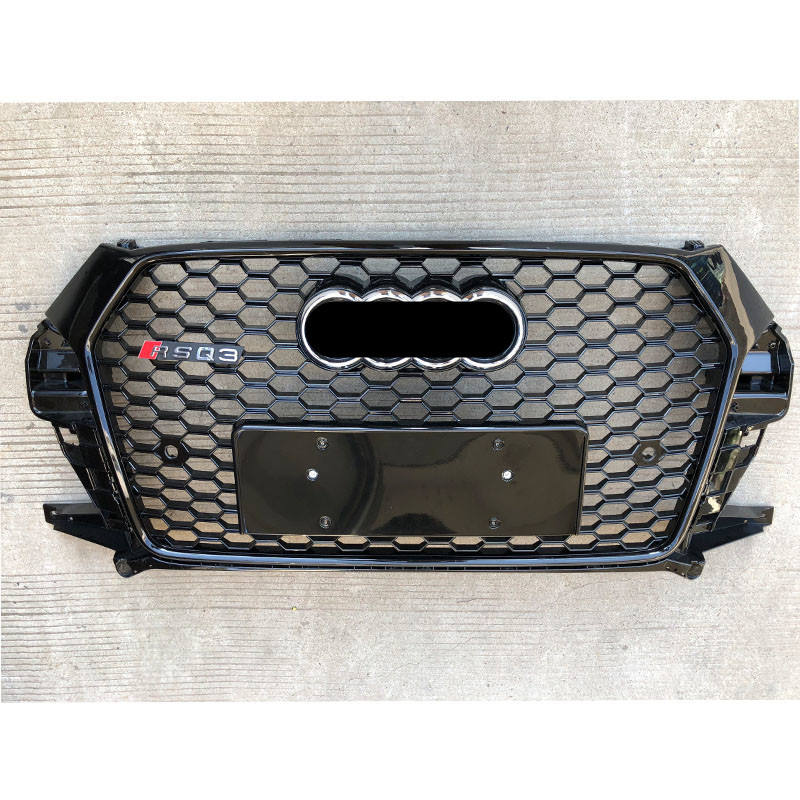 Grille à badge argentée avec cadre noir