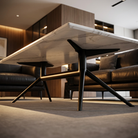 Table basse moderne en marbre blanc avec base araignée en métal noir élégante pour un bureau ou un salon minimaliste de luxe