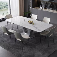 Table à manger carrée moderne haut de gamme en pierre frittée minimaliste, pliable et extensible, avec des caractéristiques en acier inoxydable super cristallin