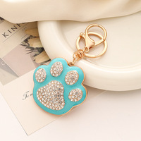 Nouveau porte-clés pendentif gland de sac mignon, style européen et américain, avec motif patte d'ours de dessin animé brodé et strass, article de mode créatif