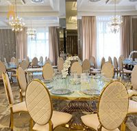 Table de salle à manger ronde de luxe en acier inoxydable doré pour événements de mariage et hôtels