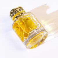 Vente en gros de flacons de parfum en verre de luxe de 100 ml, vides, réutilisables, avec bouchon à vis, forme ronde, boîte d'emballage de 50 ml pour femmes