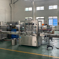 Machine de remplissage automatique à débordement pour aliments, produits de soins quotidiens, suppléments de santé, produits chimiques, liquides moussants, remplisseuse, boucheuse et étiqueteuse de bouteilles