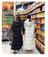 Manteau long matelassé pour femme 2026 avec capuche en fausse fourrure, grande taille, veste d'hiver rembourrée en coton, parka épaisse et chaude, prix d'usine